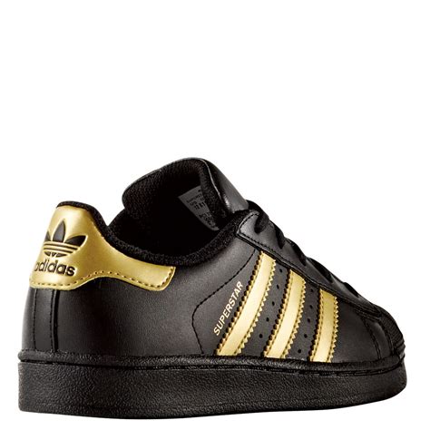 adidas 39 schwarz gold|adidas gold shoes.